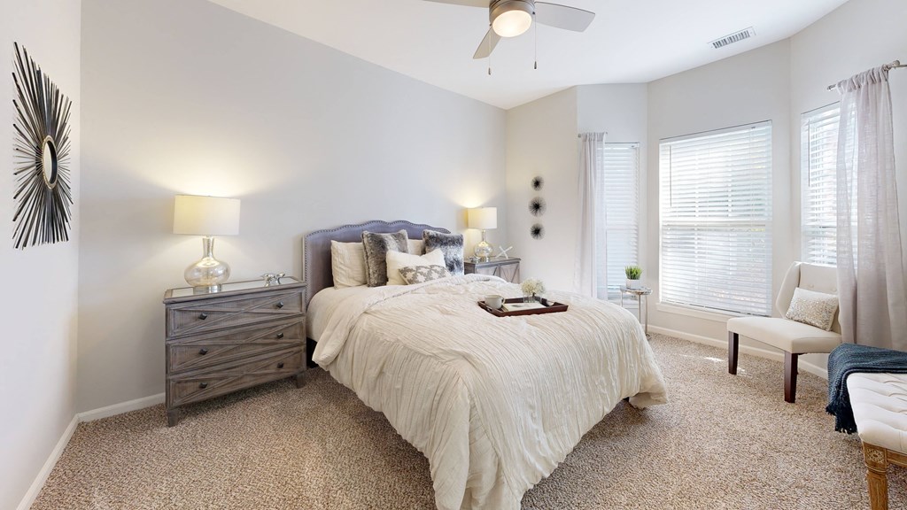 a bedroom with a bed and a ceiling fan at Dwell at Naperville, Naperville, IL