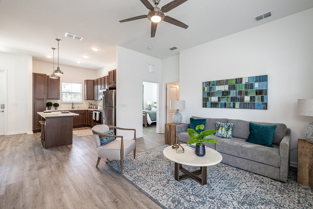 Large living room attached to a kitchen at Estia at Lakewood Ranch, Bradenton, FL, 34211