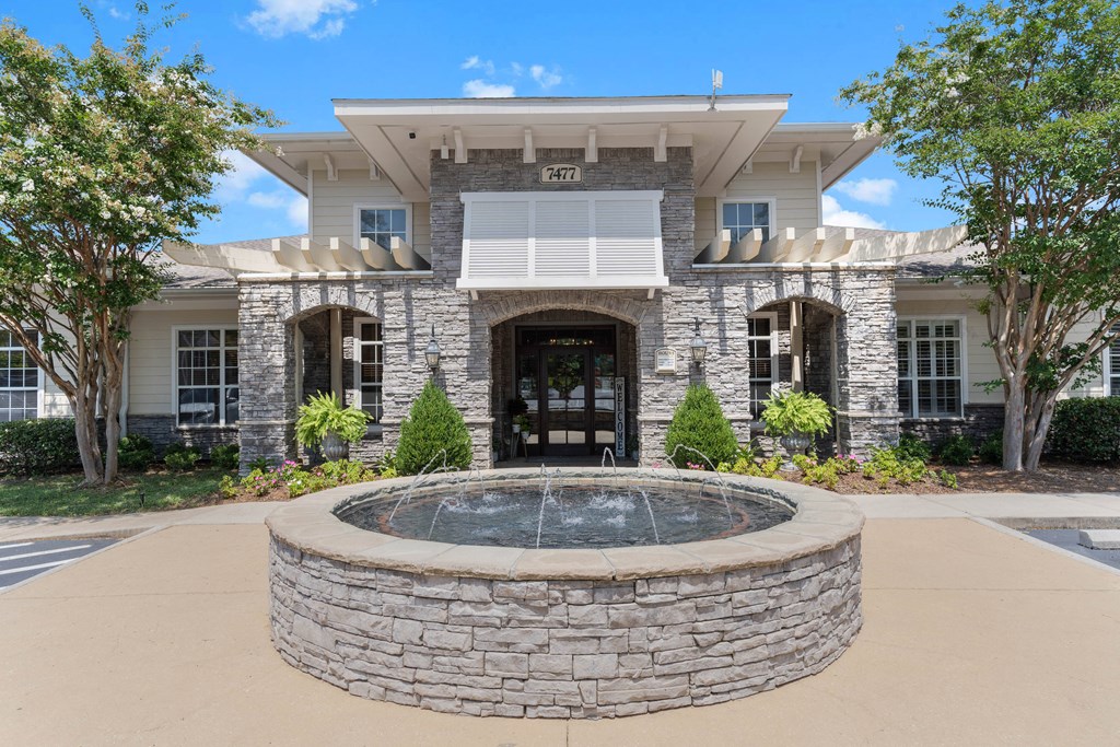 a fountain in front of a building