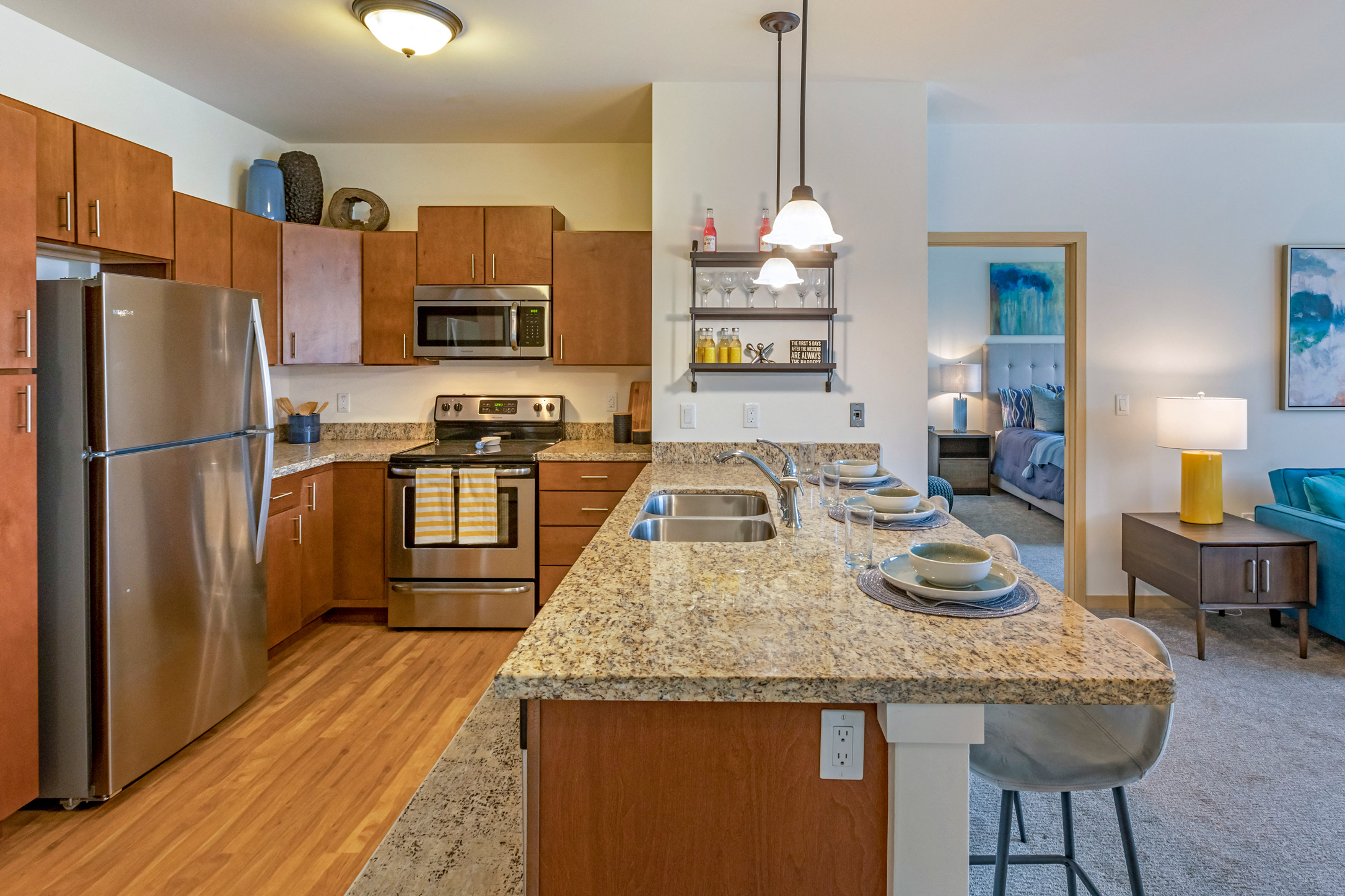 Kitchen with Island at The Enclave Luxury Apartments