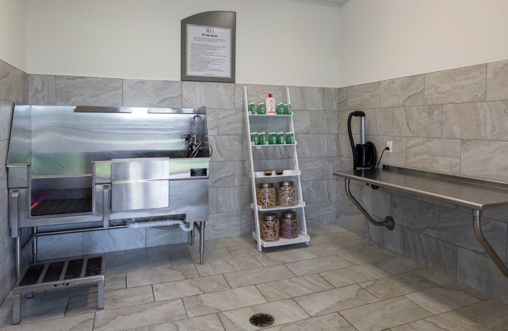 a small kitchen with a stove and a sink