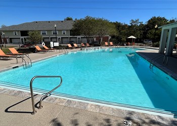 Sparkling Outdoor Pool at Highlands of Grand Pointe Apartments in Lafayette, LA - Photo Gallery 20