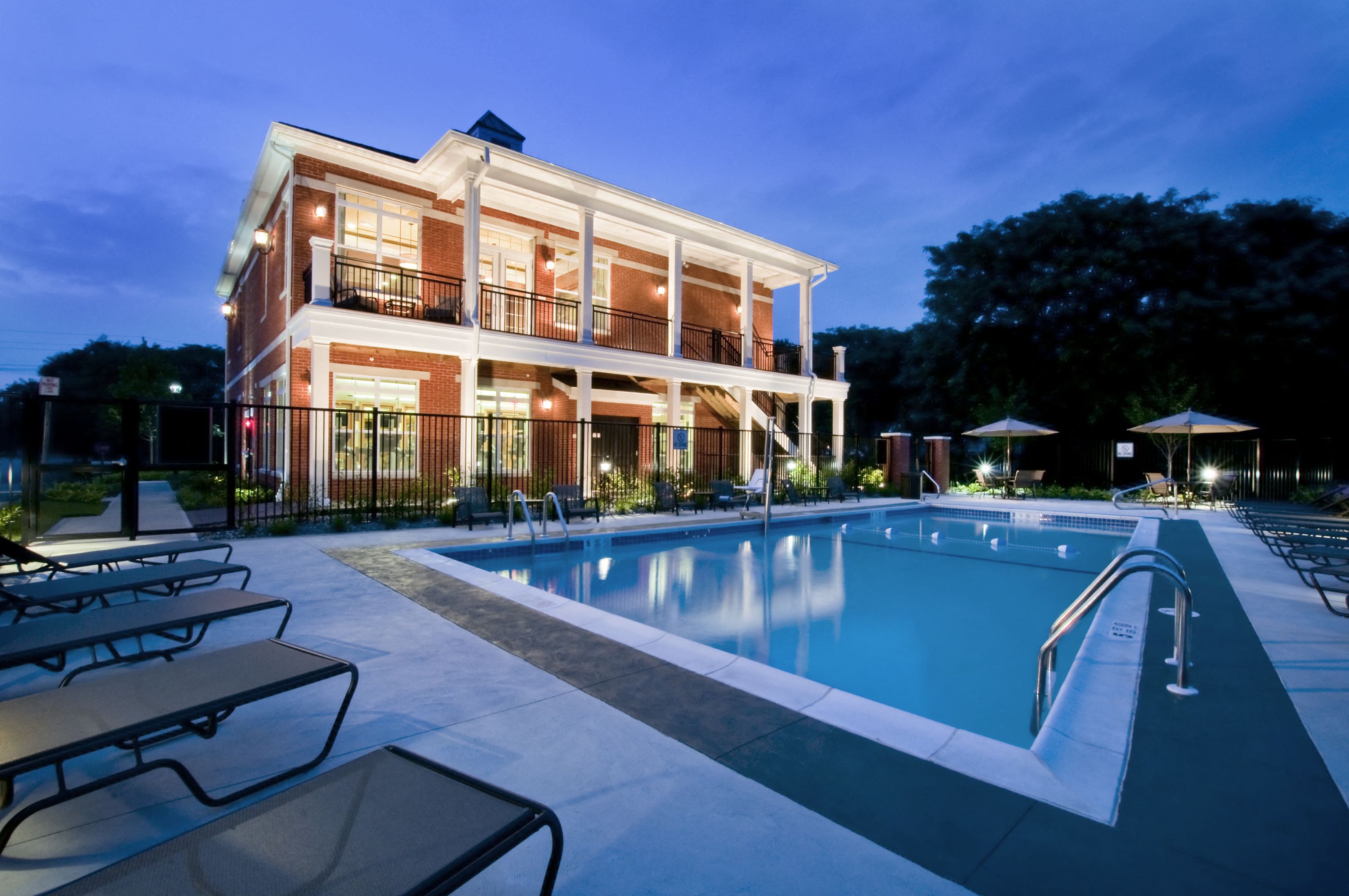 Swimming Pool at Dusk at The Reserve at Riverdale Apartments in Riverdale, NJ