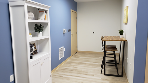 Table space and bookcase in new business center at The Enclave Luxury Apartment , Wauwatosa, 53213