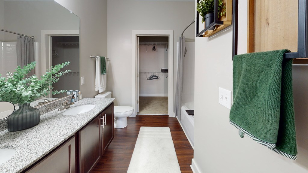 a bathroom with a toilet sink and bathtub