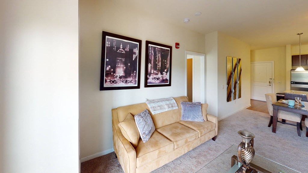 a living room with a couch and a table at The Reserve at Riverdale, Riverdale, NJ, 07457