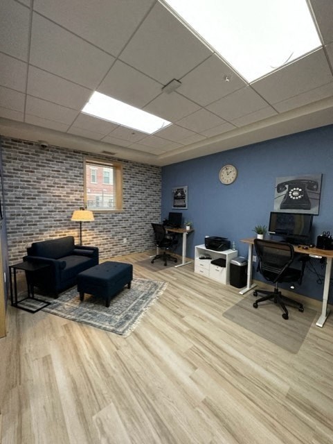 Seating area and desk in new business center