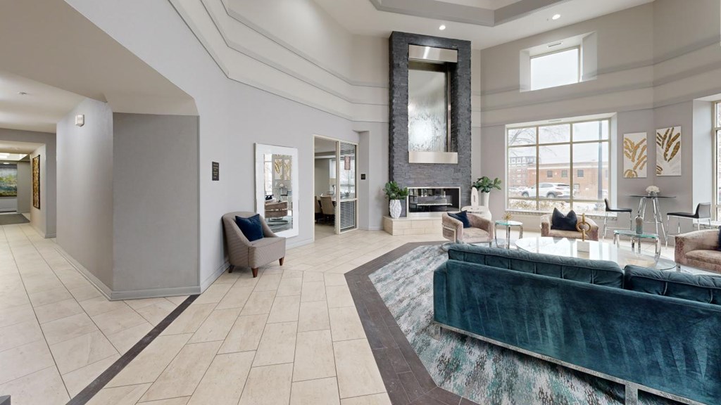 A modern living room with a pool table and a fireplace. at Wheaton 121, Illinois, 60187