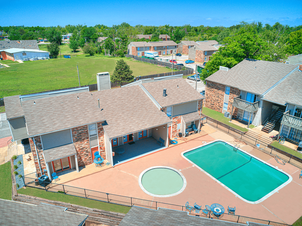 a aerial view of a house with a basketball court and a pool at Diamond  Trail Apartments, Oklahoma, 73112