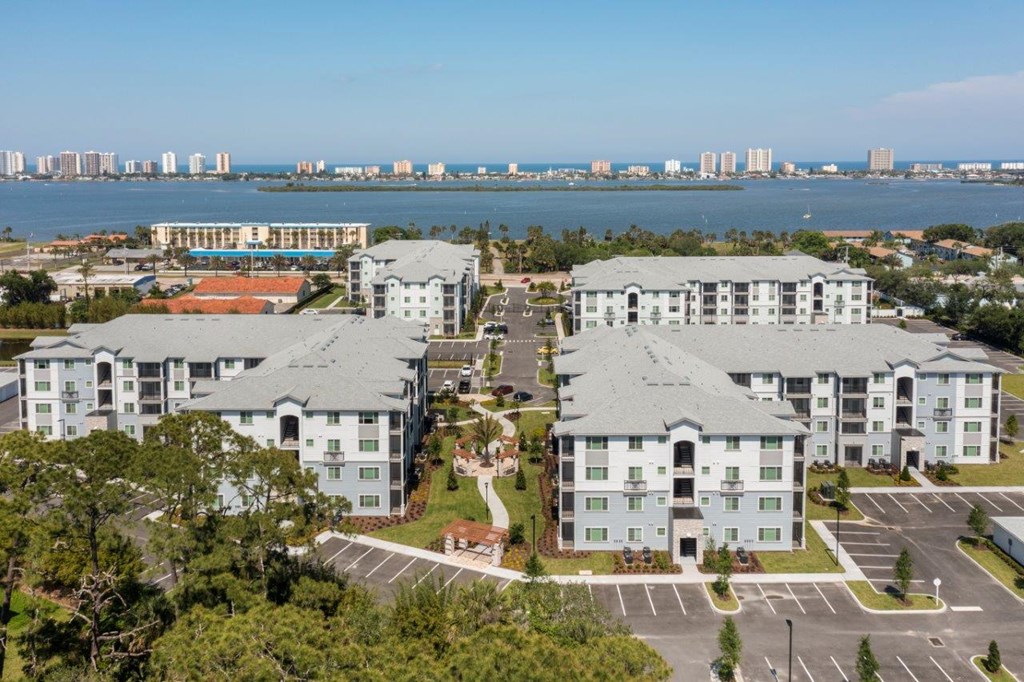 multiple squares and triangles with people in a field at Enclave at 3230 Apartments, Florida