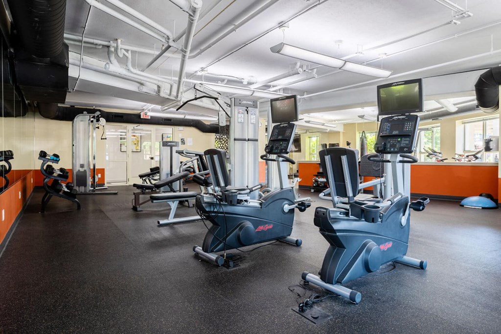 a gym with cardio equipment and weights in a building at Wheaton 121, Wheaton, IL, 60187