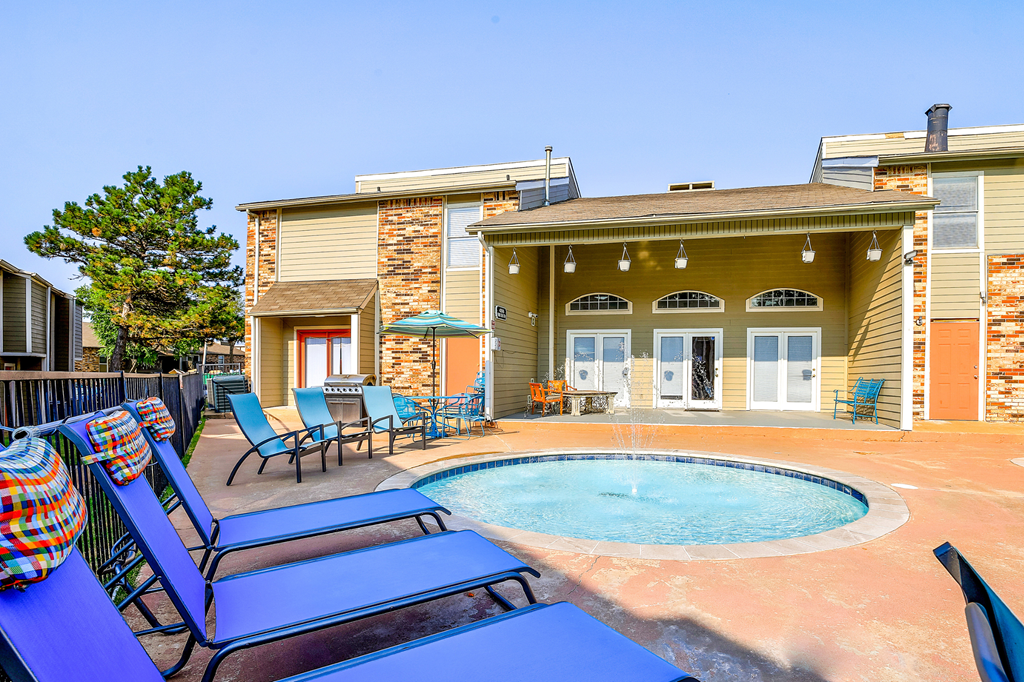 the private pool and jacuzzi in the backyard of a house at Diamond  Trail Apartments, Oklahoma City, Oklahoma