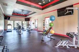 Fitness Center Fitness Center at 2400 Briarwest Apartments, Texas - Photo Gallery