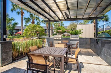 Outdoor Grill Station at 2400 Briarwest Apartments, Houston, TX - Photo Gallery 3