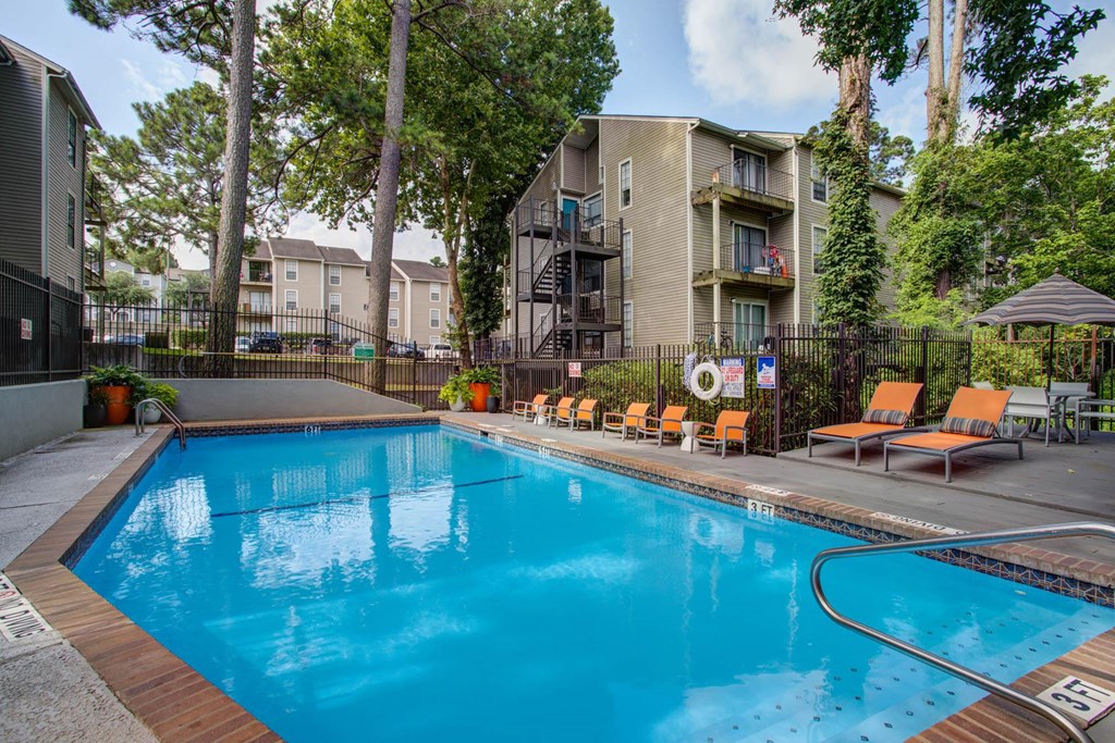 our apartments have a large pool and lounge chairs
