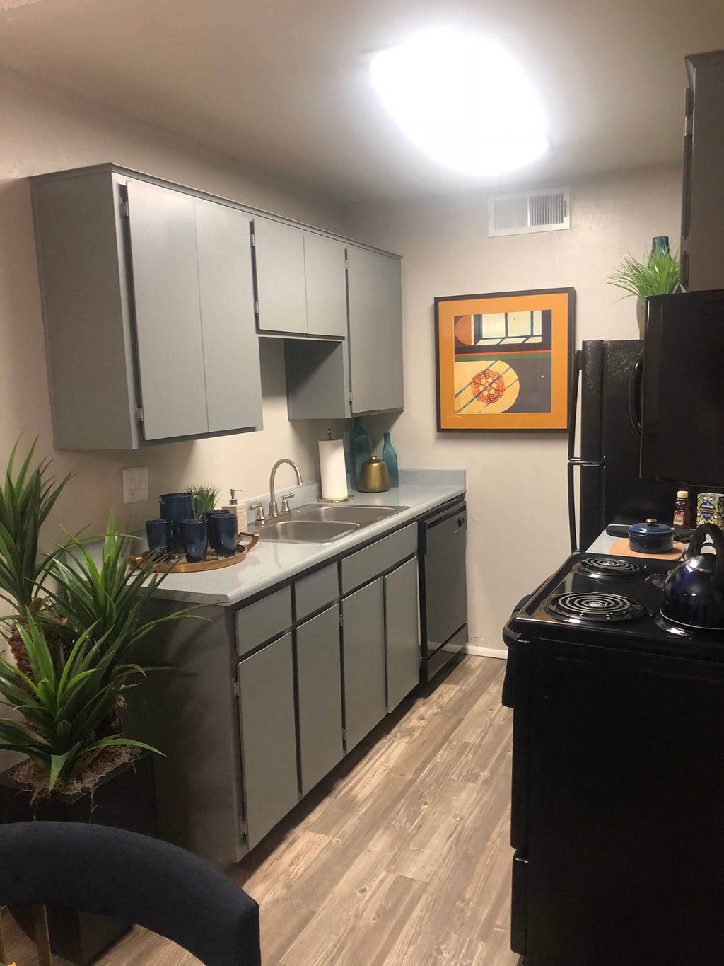 Updated Kitchen With Black Appliances at Elevation Apartments, Tucson