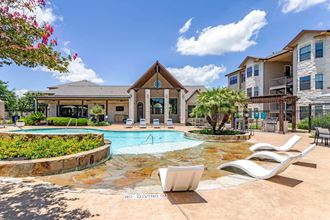 Swimming Pool With Relaxing Sundecks at Park Hudson Place Apartments, Bryan, Texas