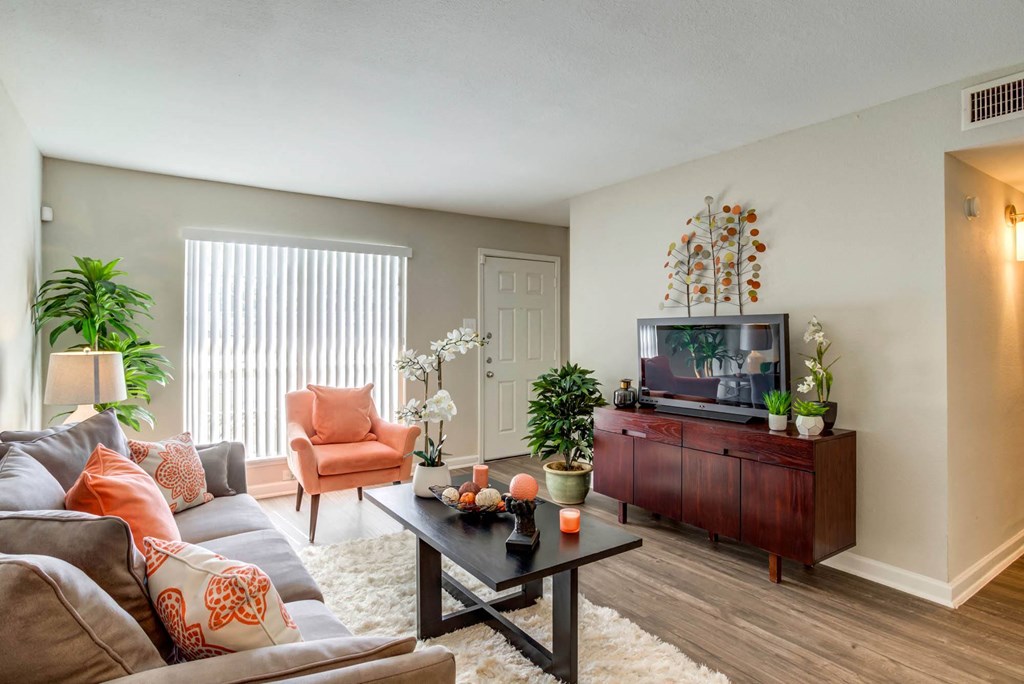 Living Room With TV at The Reserve at City Center North, Houston, TX