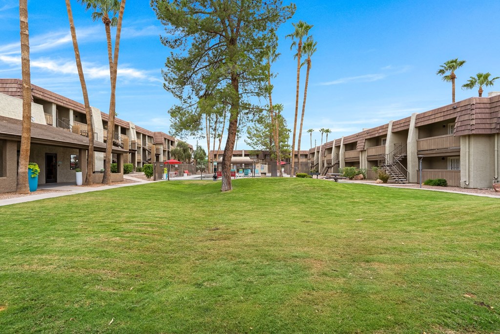 Verde Apartments buildings with grass in front. Tucson, AZ, 85719