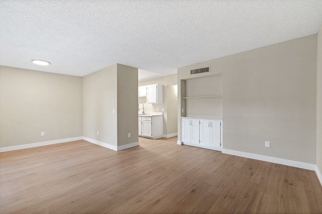 Kitchen and Living Room Area with no furniture at Verde Apartments, Tucson, AZ and a kitchen