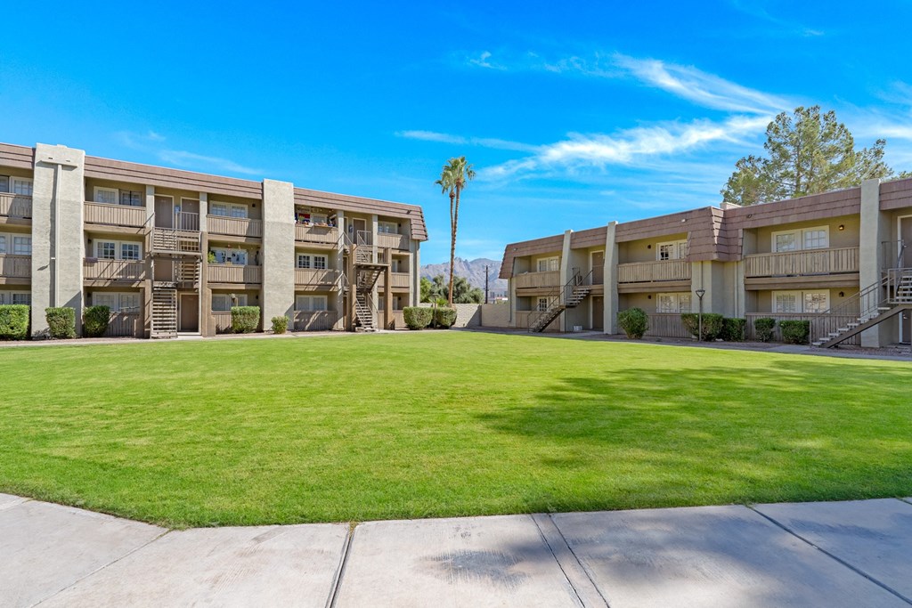 Property Exterior with Lawn at Verde Apartments in Tucson, AZ, 85719