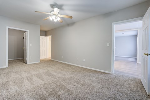 A spacious room with a ceiling fan and carpeted floor.at Metro 5514, Texas, 77021