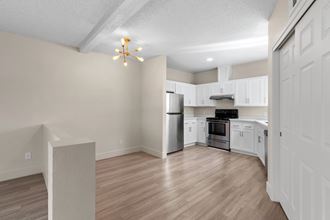 Wood Floor Dining Room at San Xavier Casitas Apartments, Commerce Capital, Arizona - Photo Gallery 2