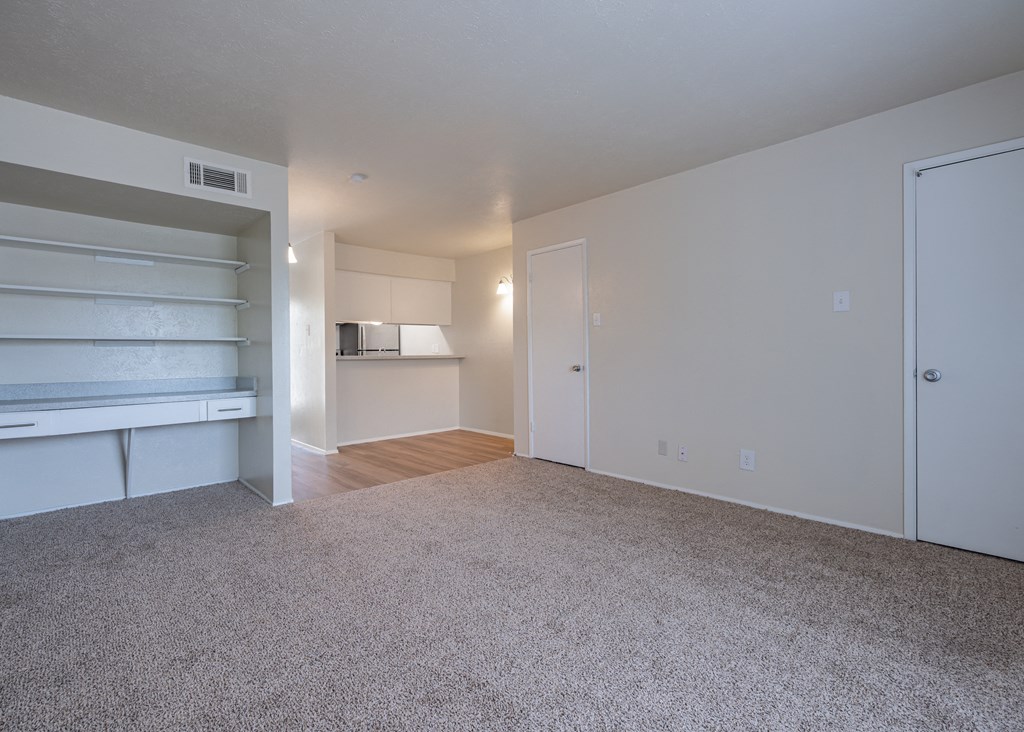 Bedroom with a white wall and a carpeted floor  at Willow Oaks, Bryan, TX, 77802