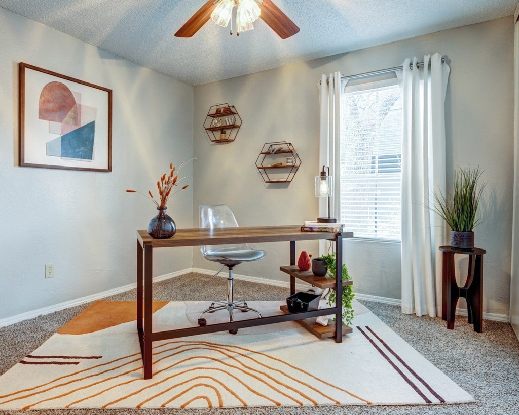 Home office with a ceiling fan and a window  at The Wick, College Station, Texas