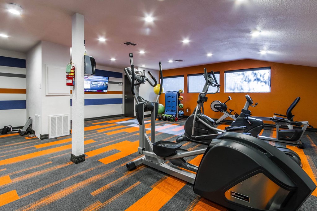 the gym is equipped with treadmills and other exercise equipment at Sundance and Sausalito Apartments, College Station