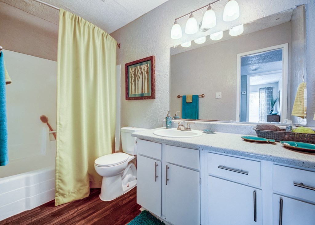 a bathroom with a sink toilet and a shower at Sundance and Sausalito Apartments, Texas, 77840