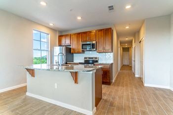 a large kitchen with a counter top