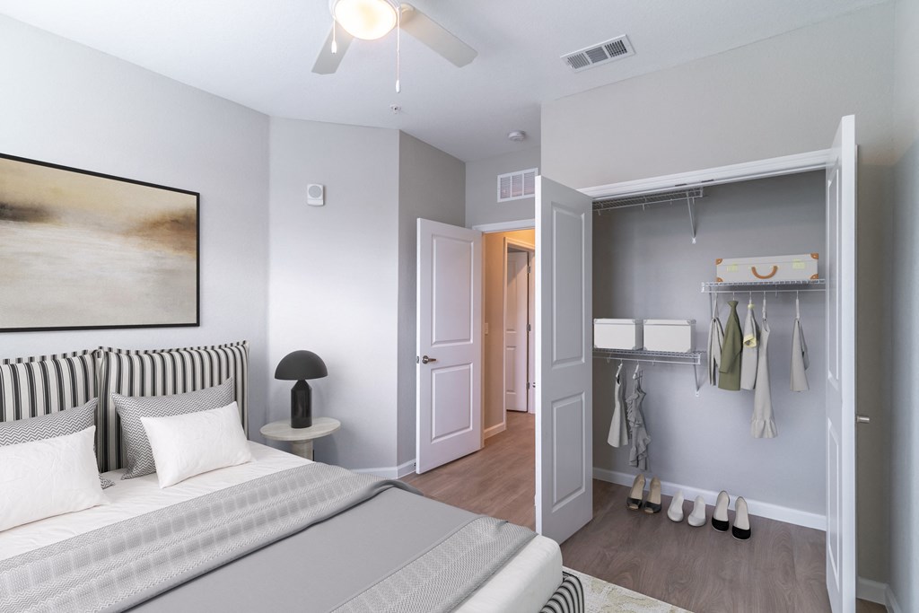 a bedroom with a bed and a closet