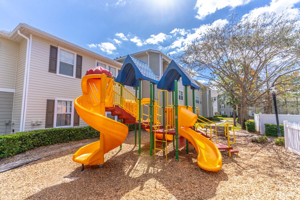 the playground at the flats at big tex apartments