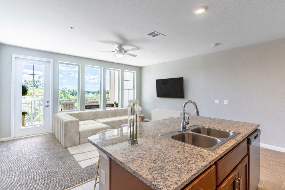 a kitchen with a sink and a counter top