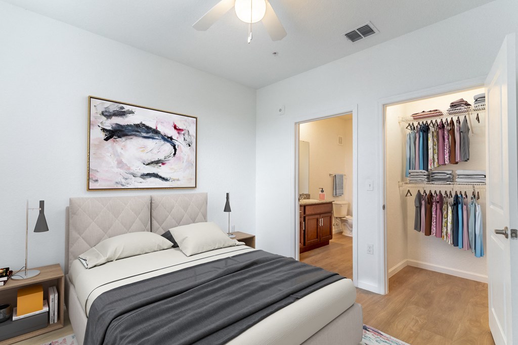 a bedroom with a bed and a closet