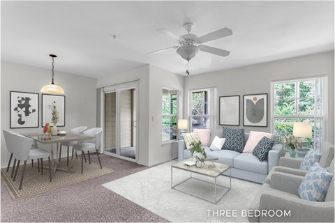 A living room with a dining table and three bedrooms.