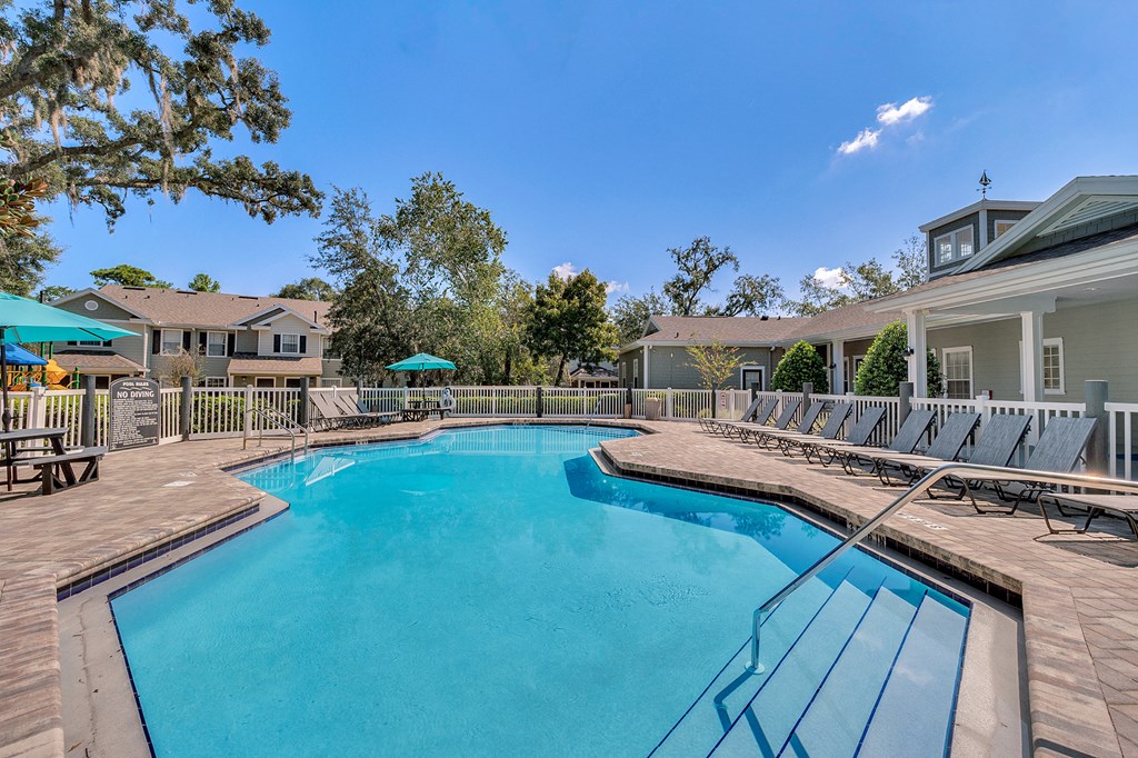 Relaxing Pool Area With Sundeck