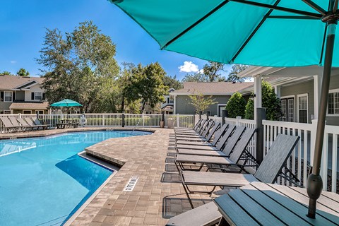 Relaxing Pool And Outdoor Entertainment Area