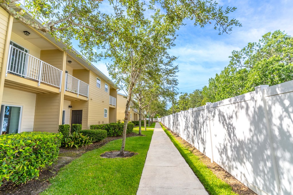 walking path with trees at Boca Townhomes