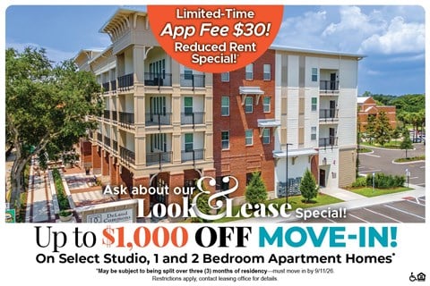 A large apartment complex advertises a limited-time app fee reduction and a move-in special.