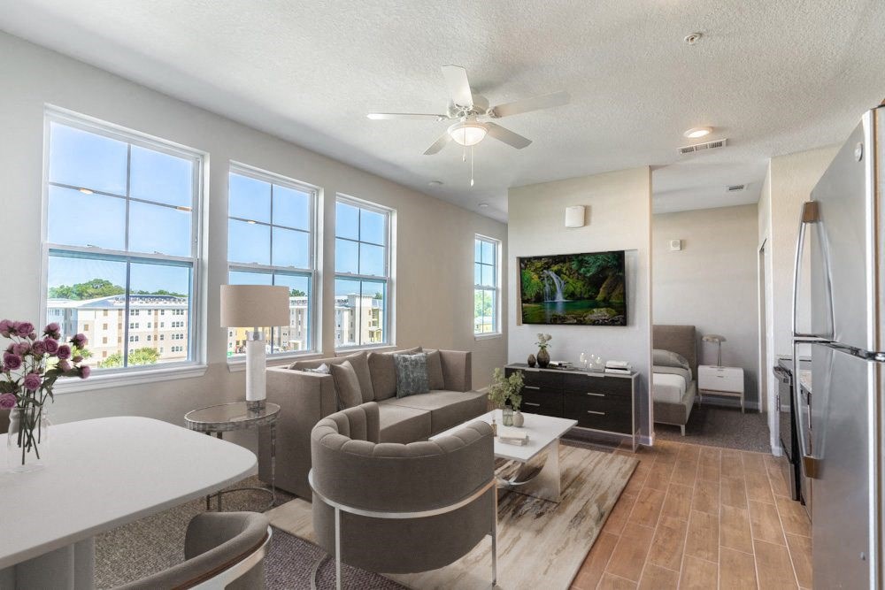 a living room with a couch and a table