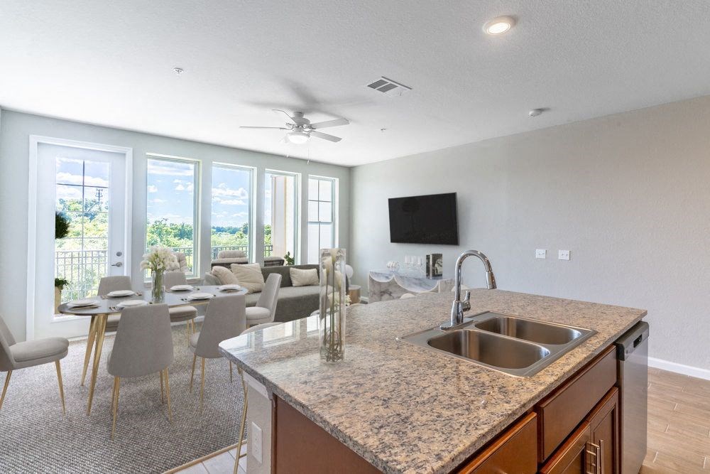 a kitchen with a counter top and a sink