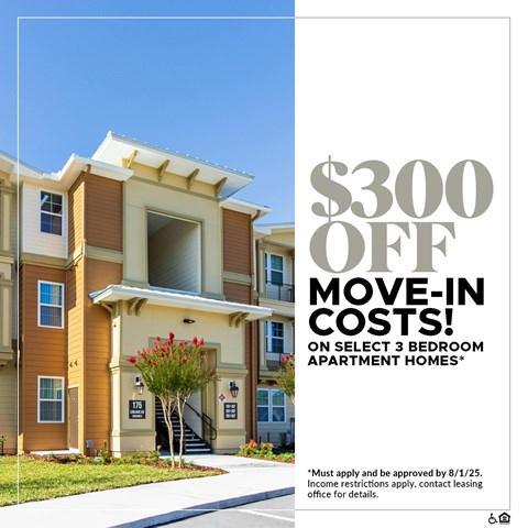 Apartment complex with a sign offering $300 off move-in costs.