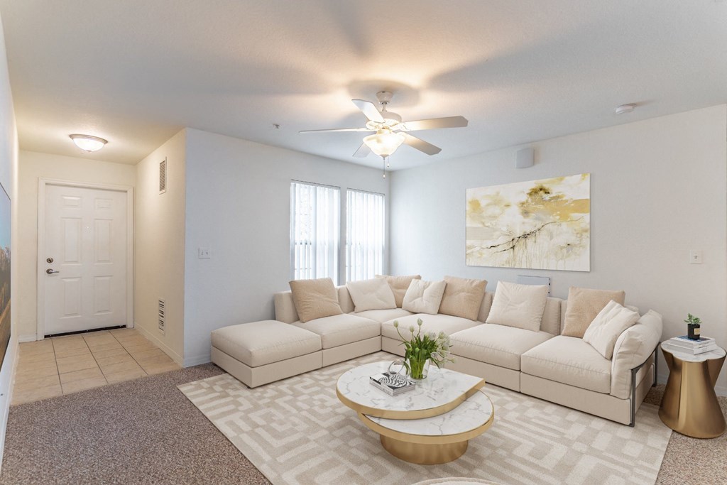 a living room with a large couch and a coffee table