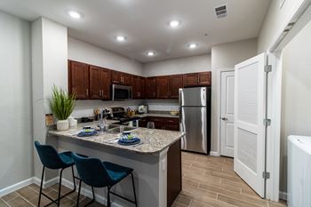 Open Kitchen with Breakfast Bar and Pantry