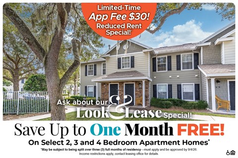 A housing advertisement offering a free month's rent for select apartment homes.