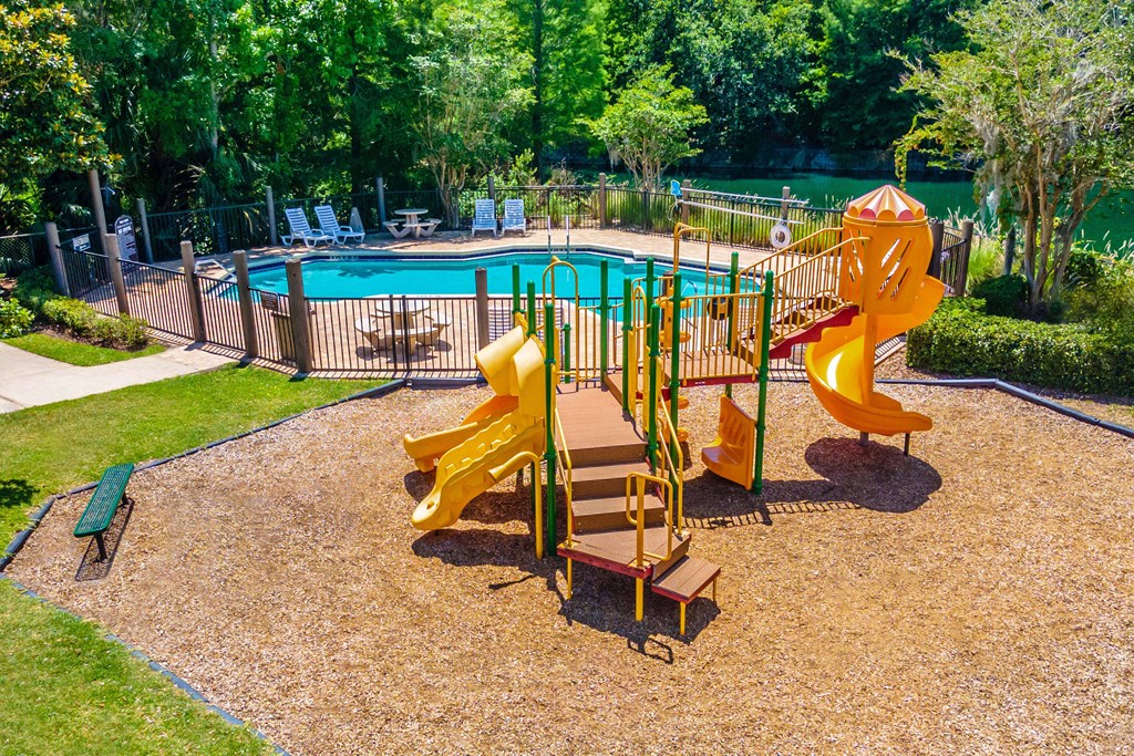 our apartments showcase a swimming pool with nearby playground