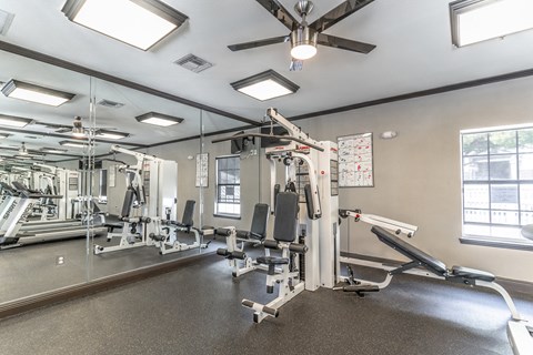 the gym at the whispering winds apartments in pearland, tx