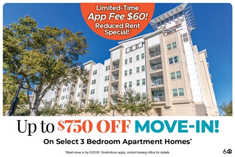 Apartment building with a sign offering a $750 move-in special.